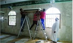 Volunteers restore Al-Qadeeh mosque